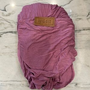 Tuck and bundle baby wrap